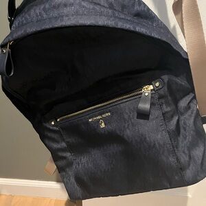 michael kors backpack navy with gold logo and zipper